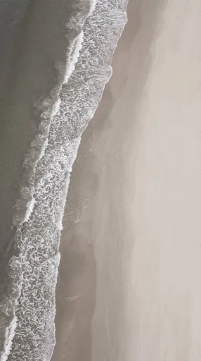 Minimalist Aerial View of Neutral Beach