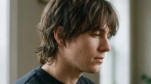 Young Man With Shaggy Brown Haircut