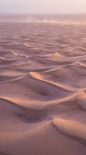 Pastel Dusk Over Sweeping Desert Sand Dunes