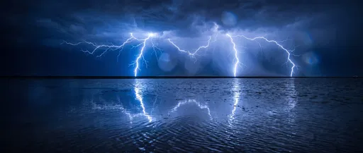Electric Blue Lightning Over Dark Water