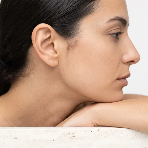 Close-Up Profile of Woman Resting Chin