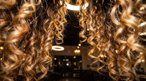 Golden Blonde Curls Framing Salon Interior
