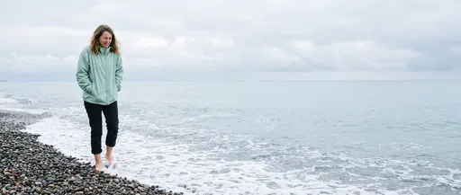 Woman Grimacing in Cold Ocean Water