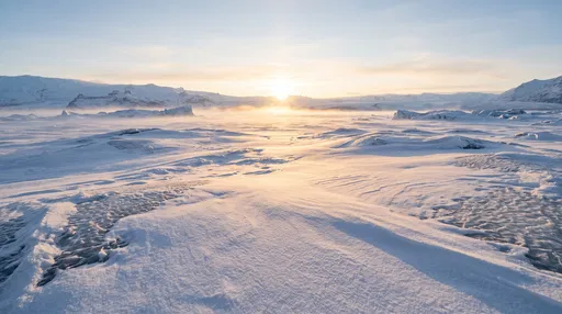 Golden Sunrise Over Frozen Glacial Landscape