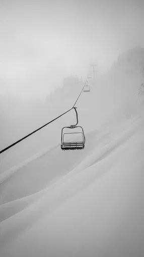 Minimalist Ski Lift in Mountain Fog