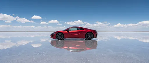 Red Supercar Reflected on Salt Flat