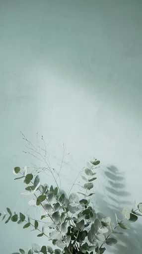 Eucalyptus Stems Against Pastel Teal Wall