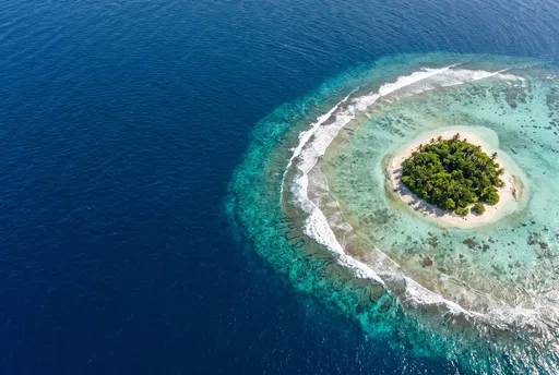 Aerial View of Small Tropical Coral Island