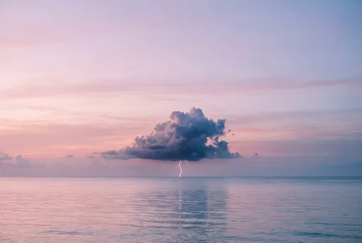 Isolated Storm Cloud Over Pastel Ocean