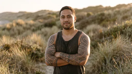 Man With Polynesian Sleeve Tattoos Outdoors