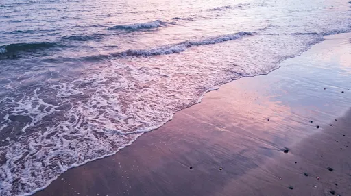 Pastel Twilight Waves on Wet Beach Sand