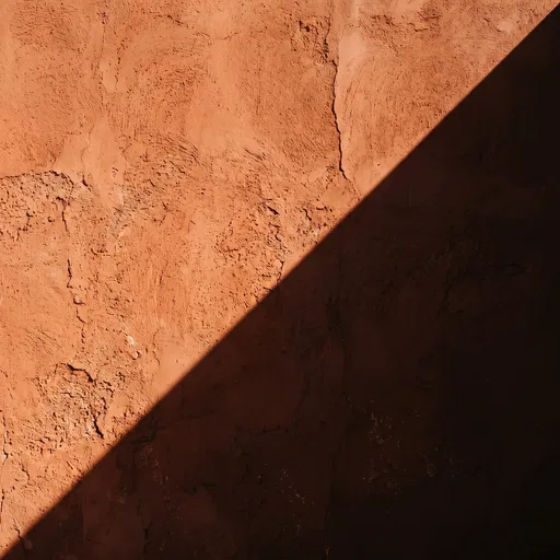 Terracotta Stucco Wall With Diagonal Shadow