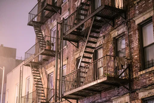 Brick Tenement Fire Escape at Dusk