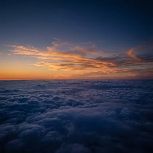 Aerial View Above Clouds at Dusk