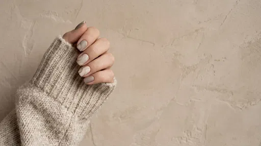 Neutral Swirl Nail Art with Knit Sweater