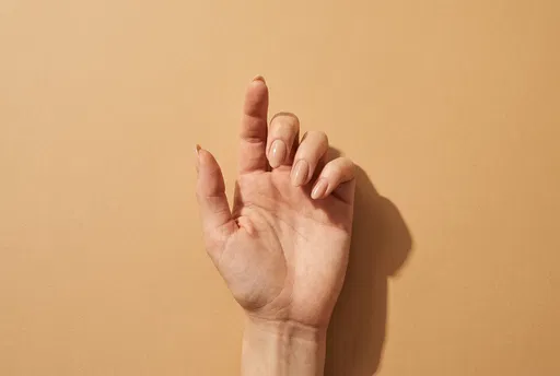 Manicured Hand Open Palm Flatlay