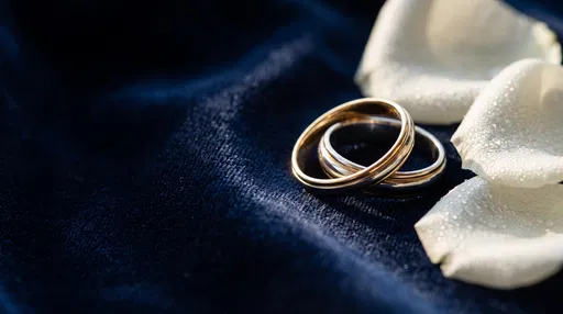 Wedding Bands on Navy Velvet with Petals