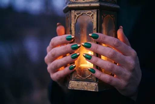 Emerald and Gold Nails Holding Vintage Lantern