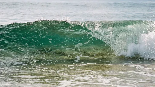 Translucent Emerald Ocean Wave Breaking