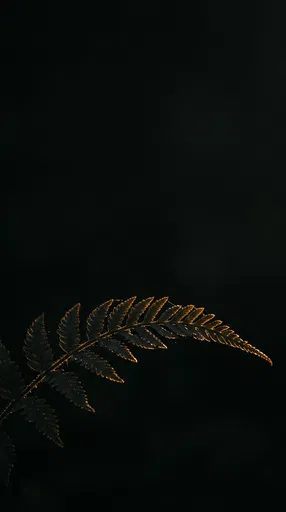 Golden Rim-Lit Fern on Black Background