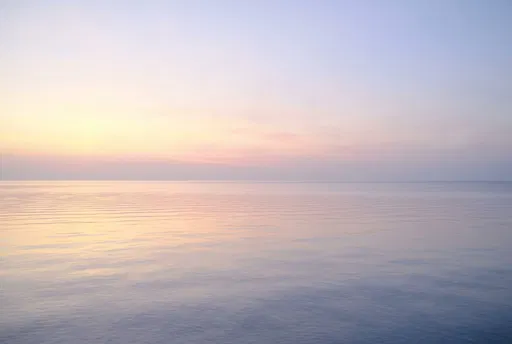 Calm Pastel Sunset Over Flat Sea