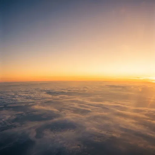 Aerial View Above Sunset Clouds