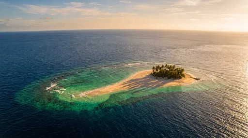 Aerial View of Isolated Tropical Island Sunset