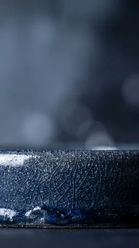 Macro Blue Crackle Ceramic Glaze Background