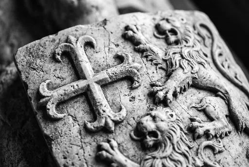 Monochrome Carved Heraldic Stone Shield Close-Up