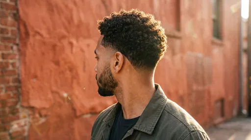 Man With Curly Drop Fade Haircut