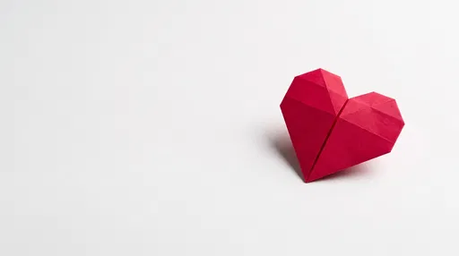 Red Origami Heart on White Background