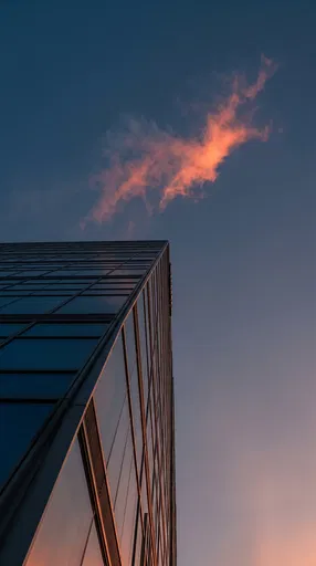 Modern Glass Building Under Twilight Cloud