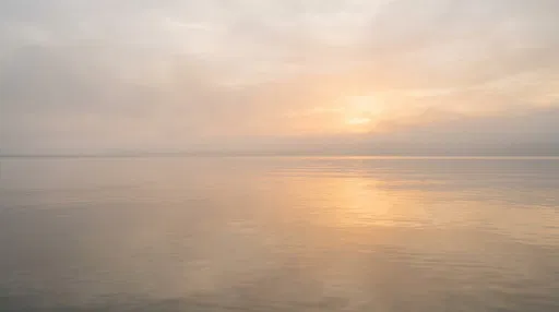 Calm Sea Sunset With Soft Reflection